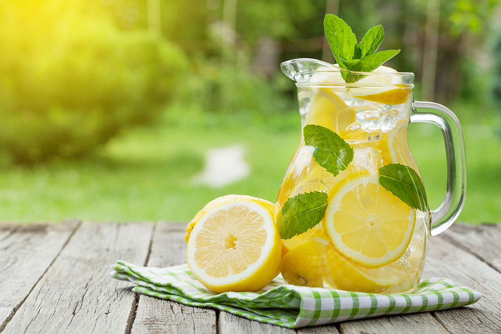 Glass of water with lemons in it healthy and refreshing